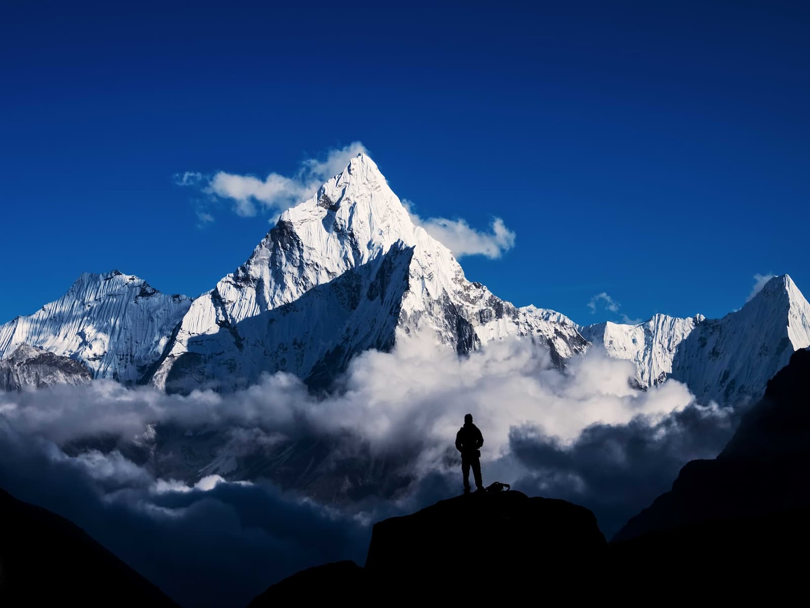 Man standing in front of montains